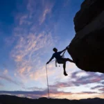 depositphotos_5549598-stock-photo-rock-climber-rappelling